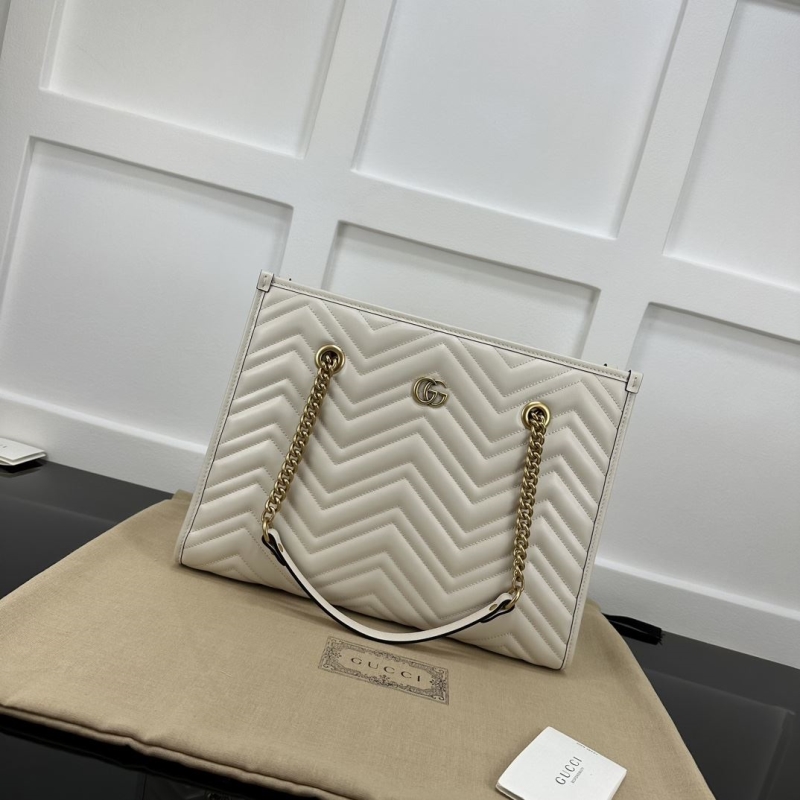 G*u*i shopping bags